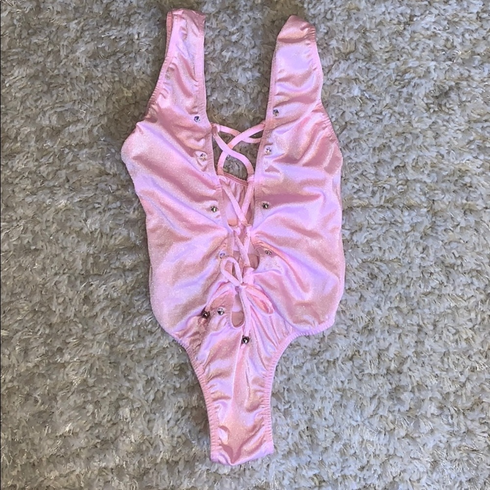 Pink body suit